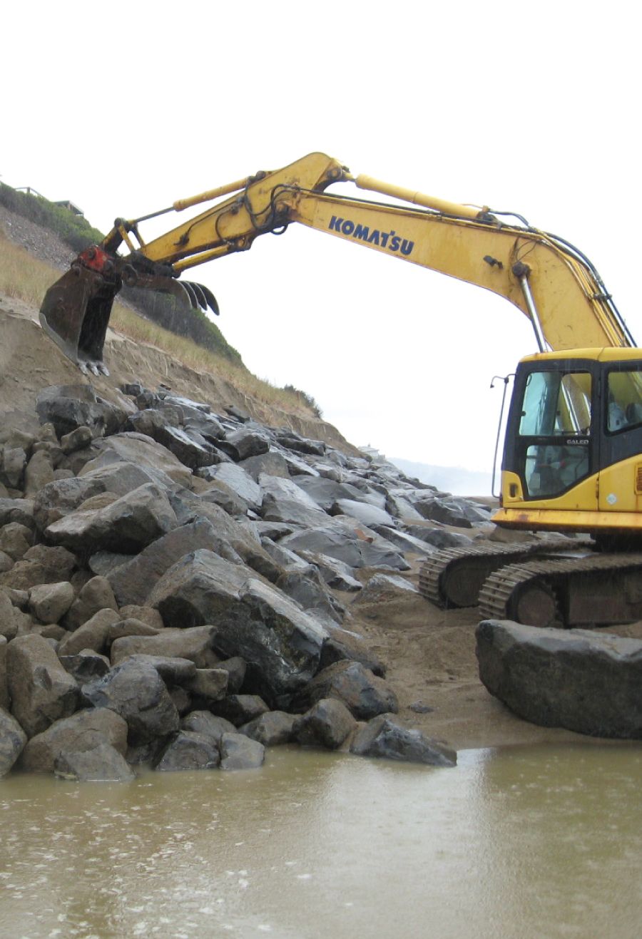 revetment services img loader in the water