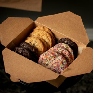 brown box with a variety of cookies