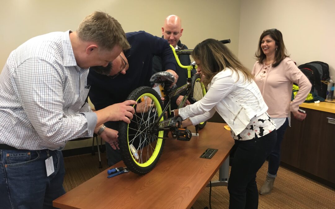 Magnovo Training Group Facilitates Charity  Bike Building Event for Salesforce