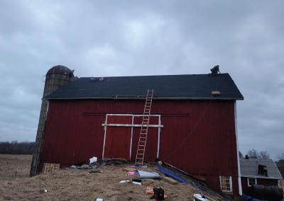 new roof on a red barn