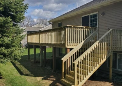 deck build with stairs down to yard